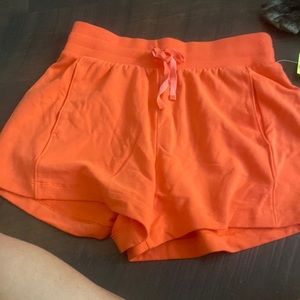 High rise orange shorts